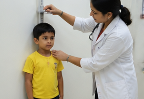 Pediatrician Examining Infant